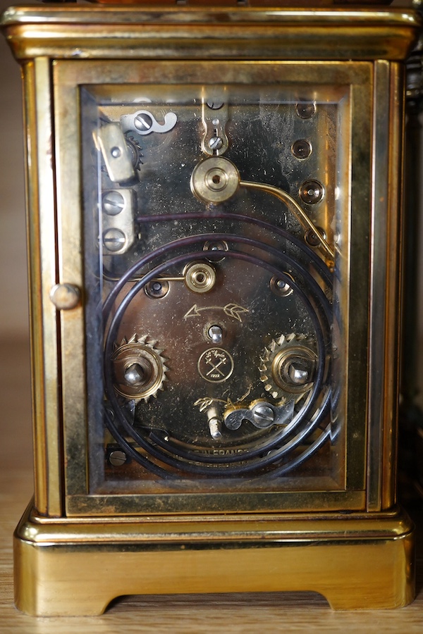 A French brass repeating carriage clock, together with another enamelled dial carriage clock, both with keys, tallest 15cm. Condition - not tested